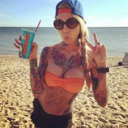 munroeink:  itattoobabes:  girl the beach girls   tattoos and piercing blog
