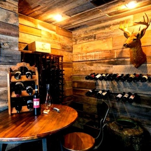 Charlotte Beach Style Wine CellarWine Cellar - Mid-sized Coastal Concrete Floor And Multicolored Floor