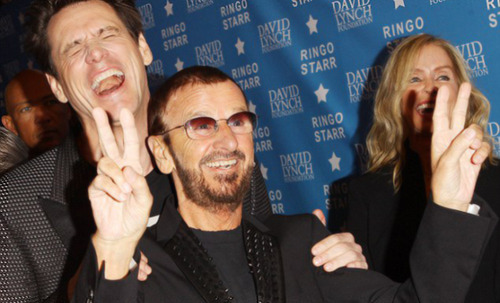 jimcarreying:  Jim Carrey’s shirt, which replaces the faces of George Harrison and Paul McCartney with Lloyd Christmas and Harry Dunne is photobombed by Ringo Starr at the David Lynch Foundation’s Lifetime of Peace & Love Award 