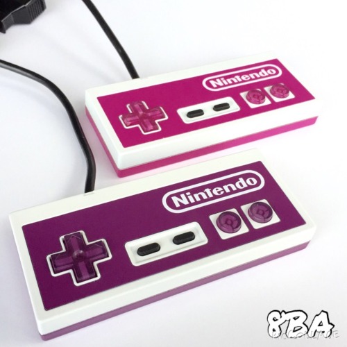 8bitaesthetics:  Custom Order: Purple/White & Pink/White NES Controllers!  www.8bitAesthetics.com