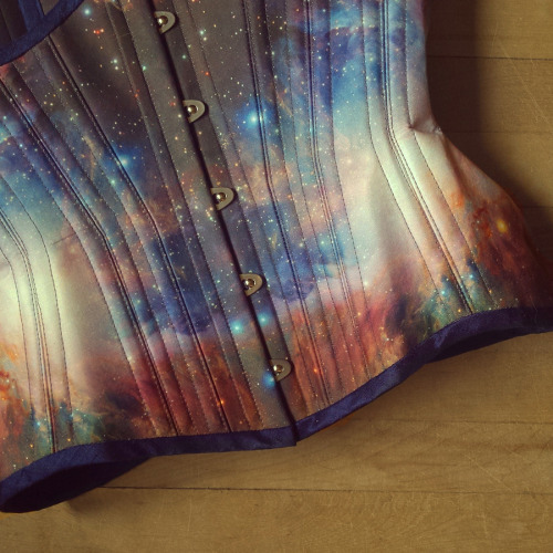 sweetnothingsnyc:  kurvendiskussionen:  retrofolie:  M42 Orion Nebula by ESO with navy binding and peachy ribbon smile emoticon   Available here: https://www.etsy.com/ca/listing/228374785/galaxy-nebula-corset-customize-print?ref=pr_shop www.retrofolie.com