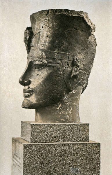 Head of Amenhotep IIIHead from monumental quartzite statue of Amenhotep III “the Magnificent” wearin