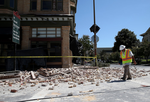 yahoonewsphotos:  Strong earthquake rocks California A powerful earthquake that struck the heart of California’s wine country caught many people sound asleep, sending dressers, mirrors and pictures crashing down around them and toppling wine bottles