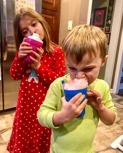 Today we ate snow. #notyellow #pink #strawberrywatermelon #sodastream #backyardtreats #bigsister #littlebrother #angryeater