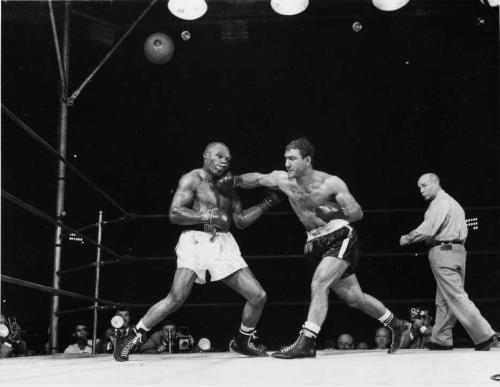 vintagesportspictures: Rocky Marciano vs Jersey Joe Walcottt  (1952)