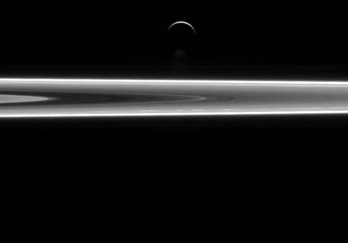 itsfullofstars:SPACE RINGS Saturn’s icy moon Enceladus and a small stretch of Saturn’s rings, as s