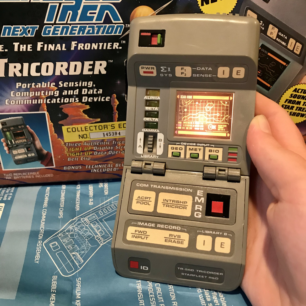 Playmates Star Trek The Next Generation Tricorder 1993 #NICEEEEEEEE #YEAH BABY WOOOOOO!!!!  #i found this at the second hand store  #still in the box never opened baby  #payed a little more then i usually would on trek stuff but i was so excited  #and also i checked online after and i actually got a fair deal  #paid a lootttt less then some people are askin for on ebay  #i LOVE the next gen tricorders they are so fucking satisfying  #i actually like them more then the TOS version  #god im so glad i found this  #my brother was like  #........ why  #also i had to use his money to buy it cuz i didnt have any on me #lol #they also had a pretty sick spock doll  #and a worf one  #but they put them in the case and i was too shy to get one of the workers  #to let me inspect it  #shoudl i go back tomorrow and look at the spock doll they had ?  #i think maybe someone had this baby one hold or they hadnt set it out yet  #cuz it wast even on a shelf it was on one of their tables  #so if i nicked it from someone who had it one hold  #im not sorry  #this shit is sick  #oh man and the box art  #you guys should hear the little beeep beeeeps it makes #star trek#90s#aesthetic#thrifting