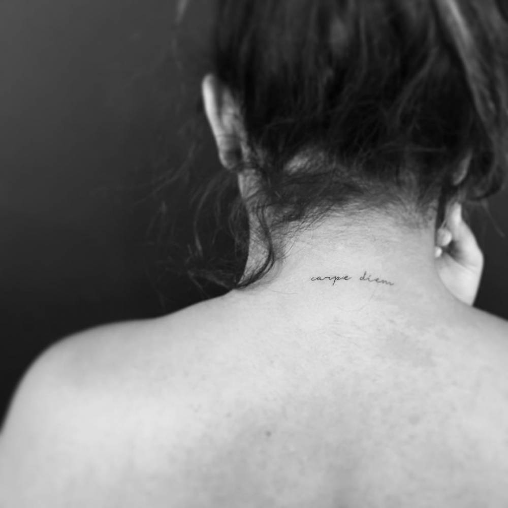 Little Tattoos — 'Carpe diem' tattoo on the back of the neck....