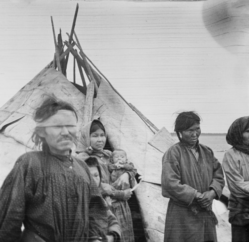 Evenks in front of their tent (Siberia, August - October 1913).