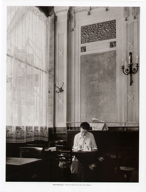 una-lady-italiana:Simone de Beauvoir in Deux Magots by Robert Doisneau