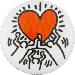 a white pin with Keith Harring's art of three people holding up a red heart