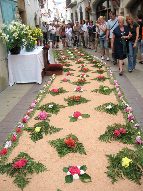 Happy International women&rsquo;s day! Flower petal carpets in Tossa de Mar.Catalonia, Spain.&nb