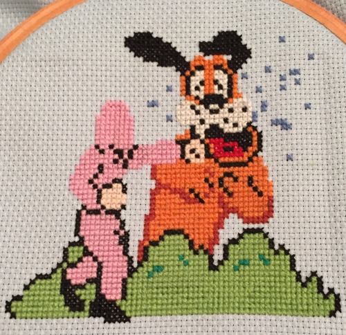 Finished my xstitch of a Nintendo mash up of Punch Out vs Duck Hunt