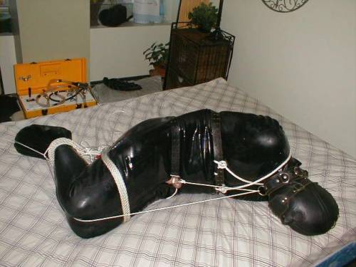 Rubber boy sealed and suffering for SIRs pleasure. (Pic of SIRs work )