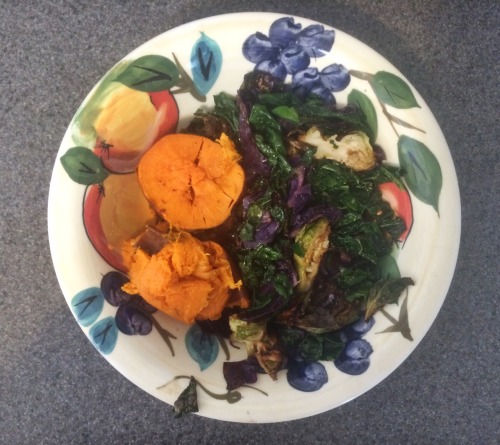 Roasted Sweet Potato with a side of coconut oil sautéed kale, brussel sprouts and red cabbage