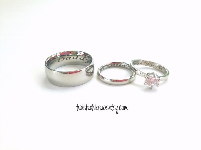 myprincessspace:  twistedskrews:  BDSM ENGRAVED couples 3 piece wedding rings set!