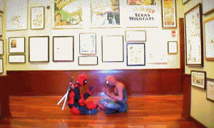 superkatvon: Deadpool and Spiderman playing patty cake. 