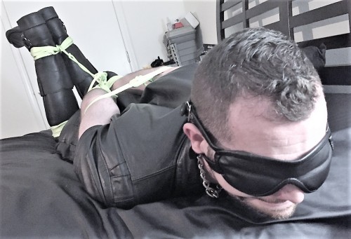 tiedupwithrope:HOT Leather guy nicely tied up and gagged.