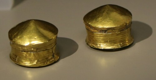 Gold Neolithic decorations. The sheet gold plaque is exceptionally thin and carefully worked. It was