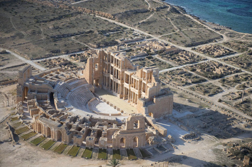 littleorangesuitcase:Ruins of a Roman theatre at Sabratha on the Libyan coast.