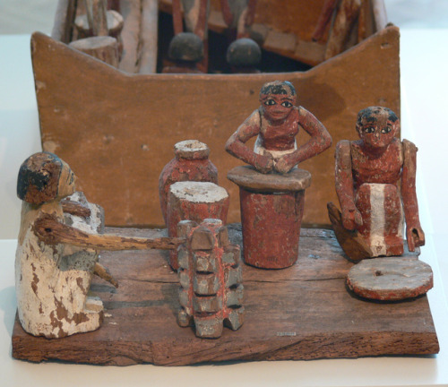 lionofchaeronea:Ancient Egyptian model of a kitchen, with figures grinding grain, baking bread, and 