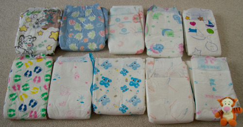 minimaxkiddo:  tiggerjunior:  It’s kind of cool so many AB diapers there are out there….. And I’m still missing some, this is just what i have right now :D    My buddy Tigger sure has an awesome abdl diaper collection going on. =)