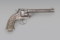 peashooter85:  A silver and semi-precious gem decorated Smith and Wesson No. 3 revolver.  Decoration work by Tiffany and Co., late 19th century. Currently on display at the Metropolitan Museum of Art. 