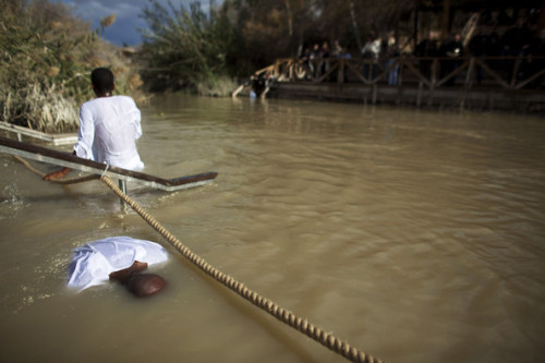 christianityoutsidethewest:Orthodox Christians Celebrate Epiphany At The River Jordan, Eritrean Orth