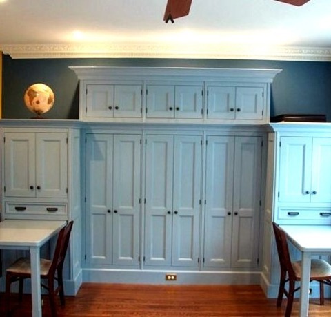 Family Room - Traditional Family Room Idea For A Game Room With A Large, Traditional, Medium-tone Wood