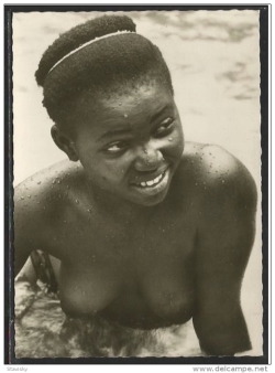   Congolese woman, via Delcampe.   