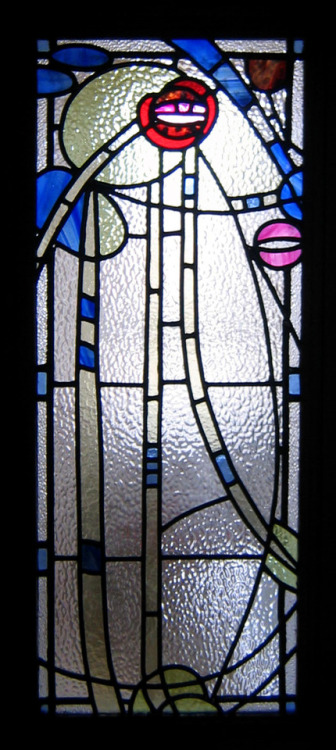 Two simplified Charles Rennie Mackintosh designs made into stained glass windows for this Glasgow ho