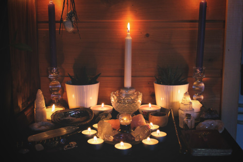 thenativewitch:  Here’s my sacred space all lit up! Much more magickal. I don’t know if 