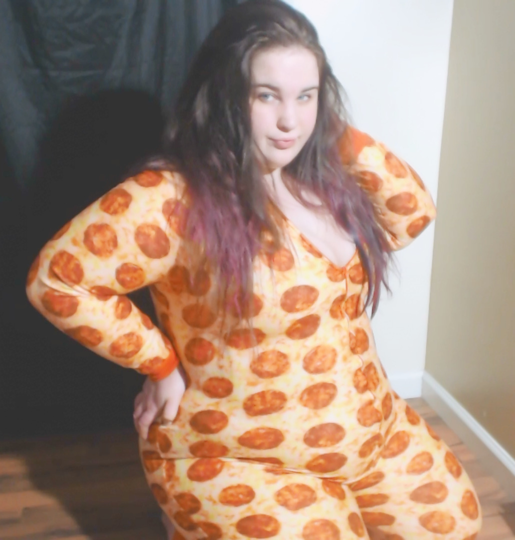 thebellygoddess:  Want a Pizza Me?  Aren’t I cute in my pizza onesie? I show off