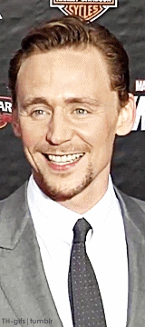 kiwimccoy:   Tom Hiddleston posing for photographers      #okay but this is GOLD #2011