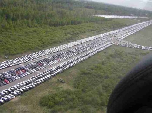 sciencevevo:mansfrombelow:canadian-communist: Where the World’s Unsold Cars Go to Die Above are pho