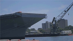 blazepress:  Firing a truck off an aircraft carrier.