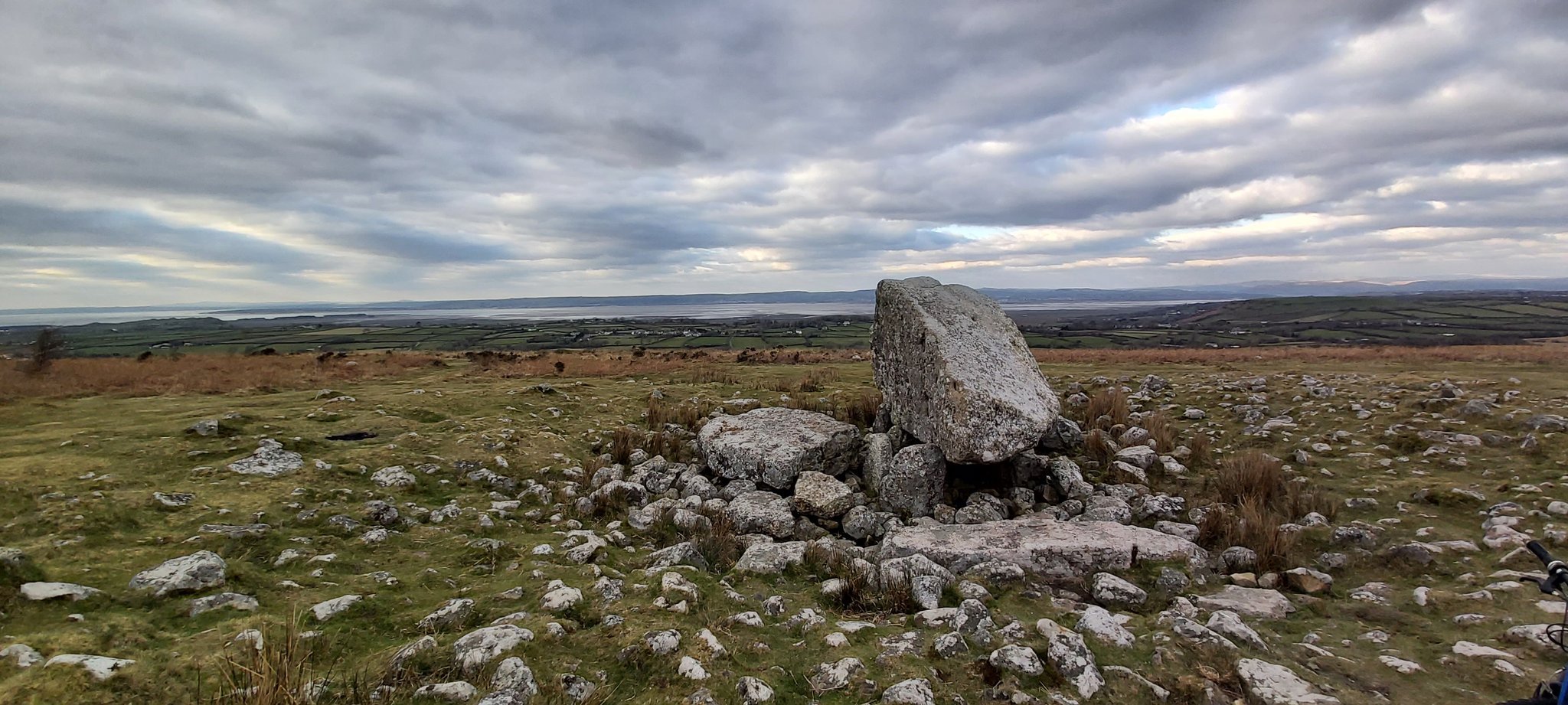 fjorrd:Maen Ceti, “Arthur’s Stone”, in Reynoldston, Wales, is a neolithic burial ground. It was built around 4,500 years ago or earlier. The chamber below the stone, for the tomb, was dug under the massive boulder and was held aloft