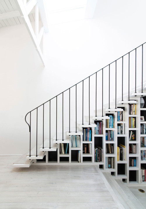 contemporist: 8 Examples of stairs that do double-duty as bookshelves