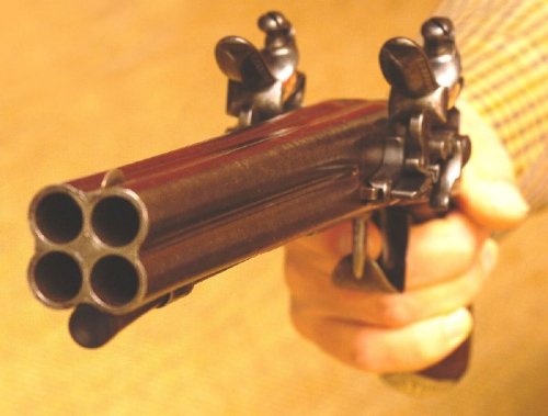 Four barreled flintlock tap action pistol.