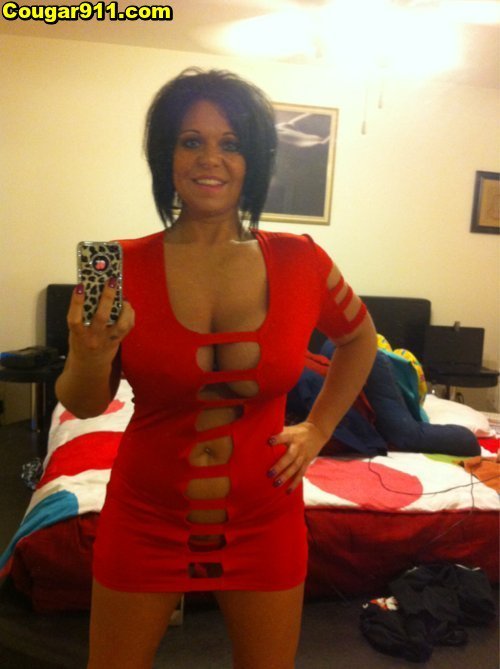 onlycougars:Milf wearing a half dress. Would you be her tailor bit.ly/1NauGEn?