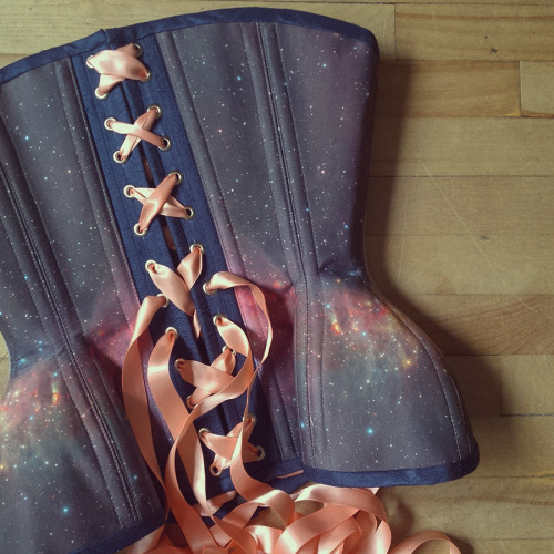 sweetnothingsnyc:  kurvendiskussionen:  retrofolie:  M42 Orion Nebula by ESO with navy binding and peachy ribbon smile emoticon   Available here: https://www.etsy.com/ca/listing/228374785/galaxy-nebula-corset-customize-print?ref=pr_shop www.retrofolie.com
