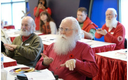 fuckingradfems:  kiriamaya:  theblogofeternalstench: New skills: Santas brush up on their sign language during a Santa School held recently at Royal City Centre. The Santas return to school each fall to fine-tune their skills for the holidays.    omg