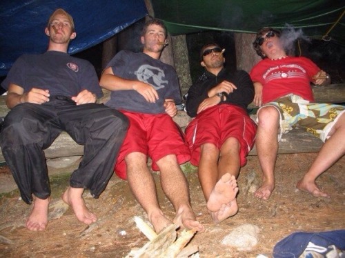 alpha-male-feet:  Camping bros smoking by