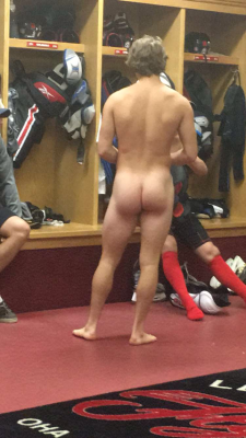 notdbd: Ontario Hockey Association locker room butt - I love how the naked player is having a casual conversation with his teammates. 