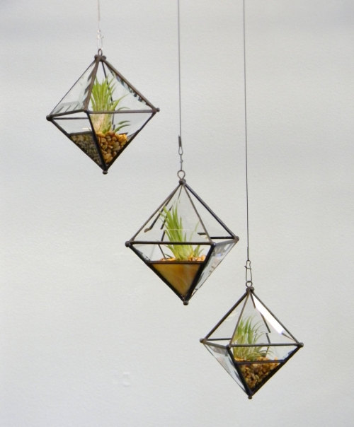 wickedclothes:  Hanging Pyramid Planter A lovely accent for any room, porch, or patio. These pyramid planter orbs come equipped with a swivel and a three-foot black line for hanging. Sold on Etsy.