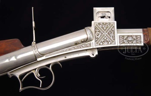 Extraordinary engraved Meigs slide action repeating rifle, circa 1880′s.from James A. Julia Auctions