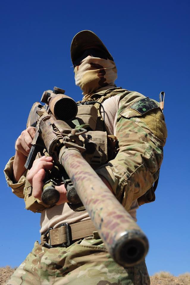 gunrunnerhell:  Suppressed Australian sniper in Afghanistan with a suppressed SR-25.