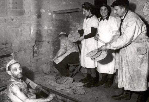 dvar22:eretzyisrael:Baking of matzahs in hiding - Poland, 1943My grandmother’s family made matzahs f