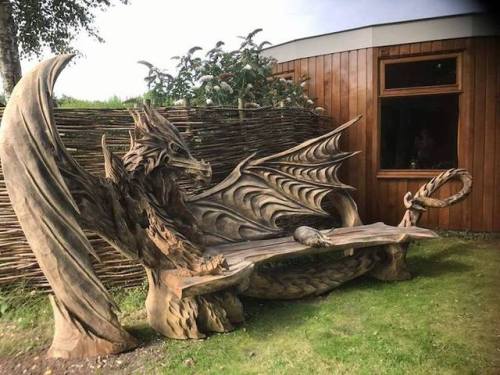 mymodernmet:Estonian Artist Uses a Chainsaw to Carve a Fantastical Dragon Bench