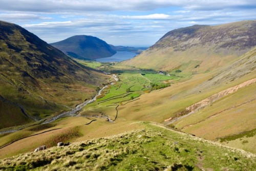 Descending from Beck Head on the the Moses Trod toward Wasdale Head in early morning light in Englan